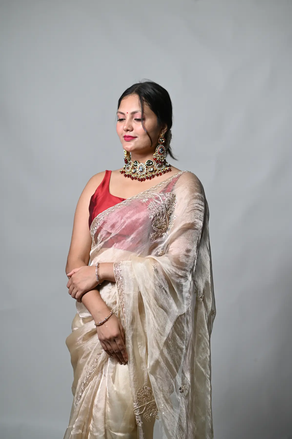 hand embroidery pure tissue golden saree